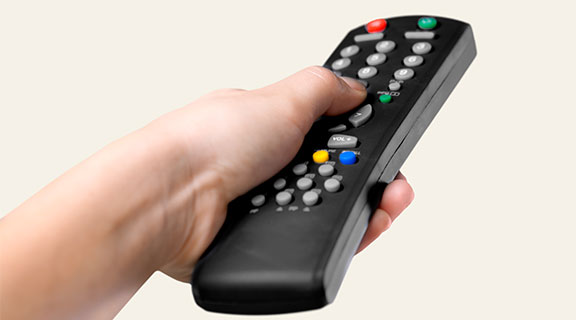 hand holding remote