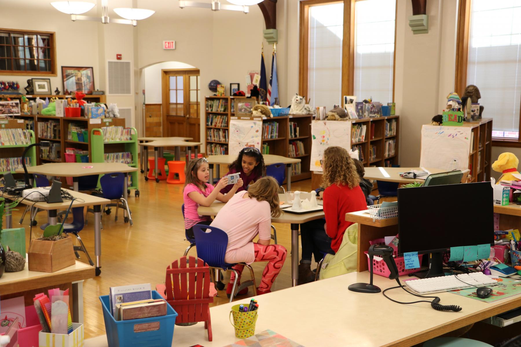 young kids in after school club classroom