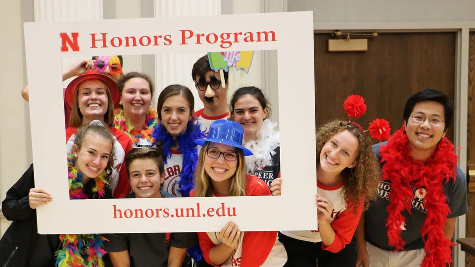 student organization members in photo frame