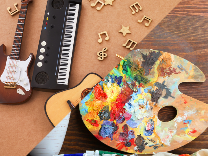 Musical instruments and a palette and paints