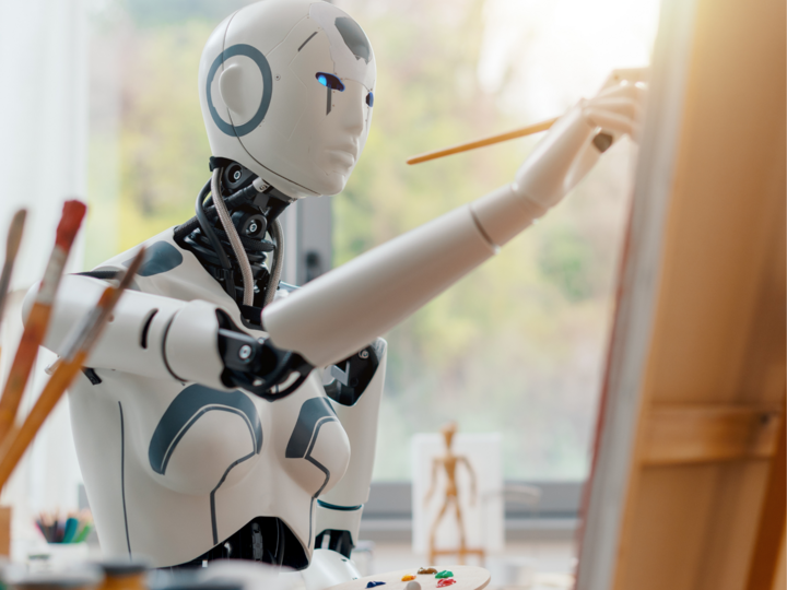 Robot painting a canvas
