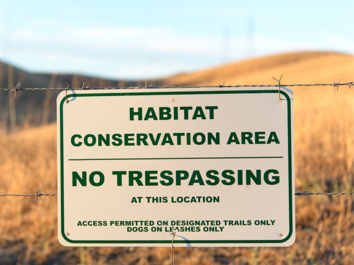 Sign reading "habitat conservation area"