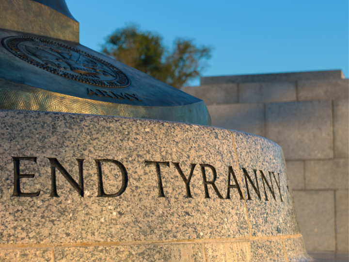 Stone pedestal inscribed with "End Tyranny"