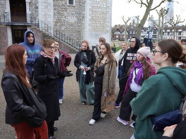 Group of students listening to someone