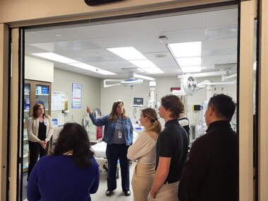 Students touring a hospital room