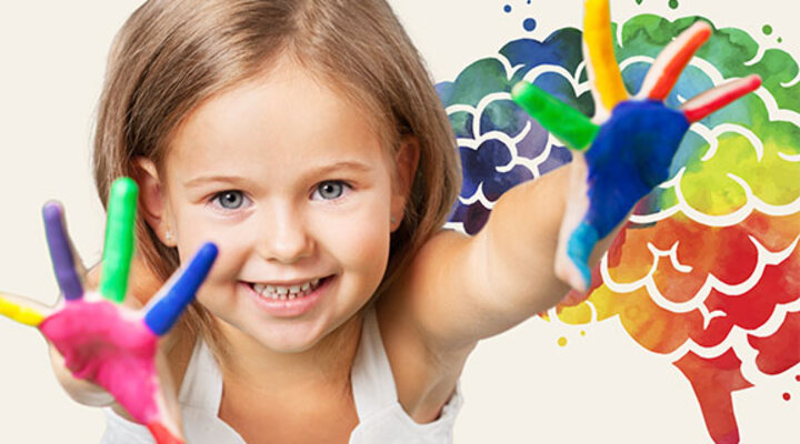 child finger painting
