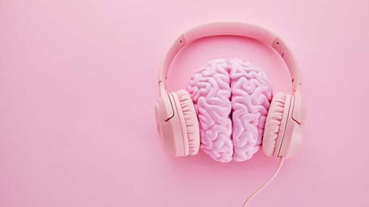 pink brain with headphones